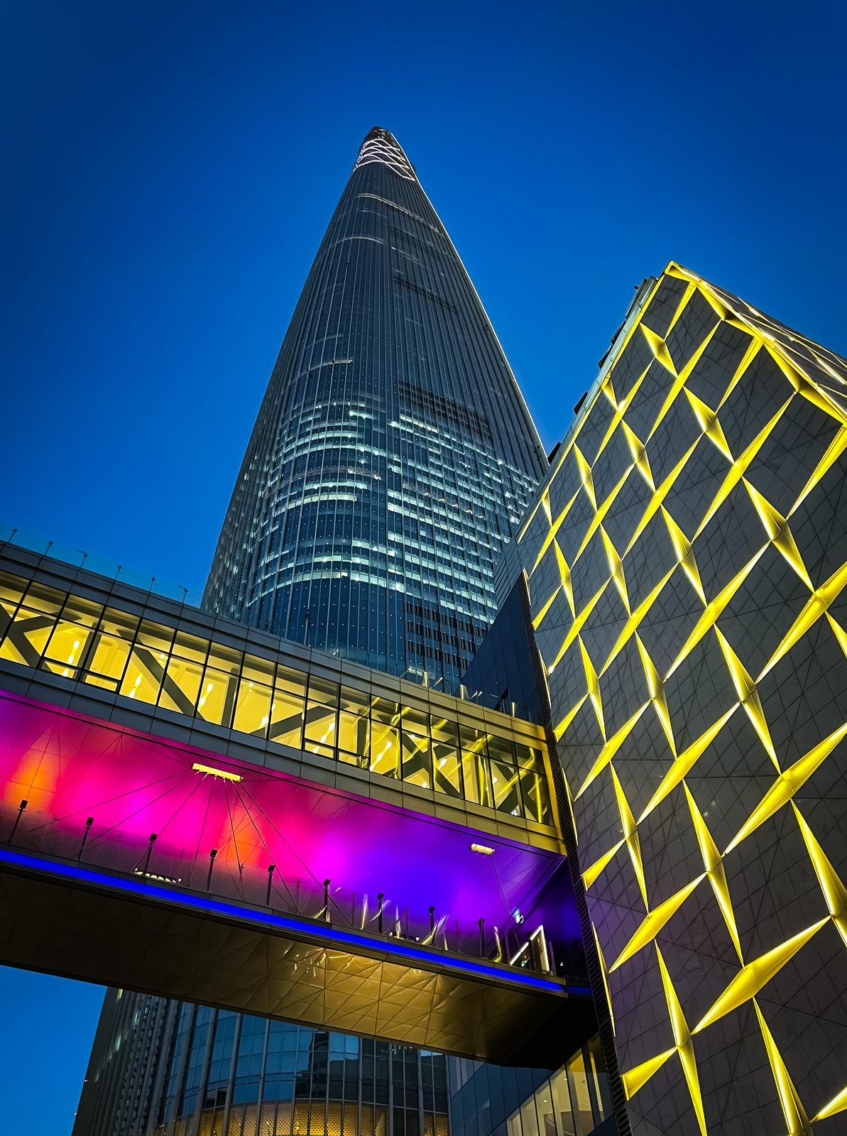 Lotte World Tower lit up at night in Seoul