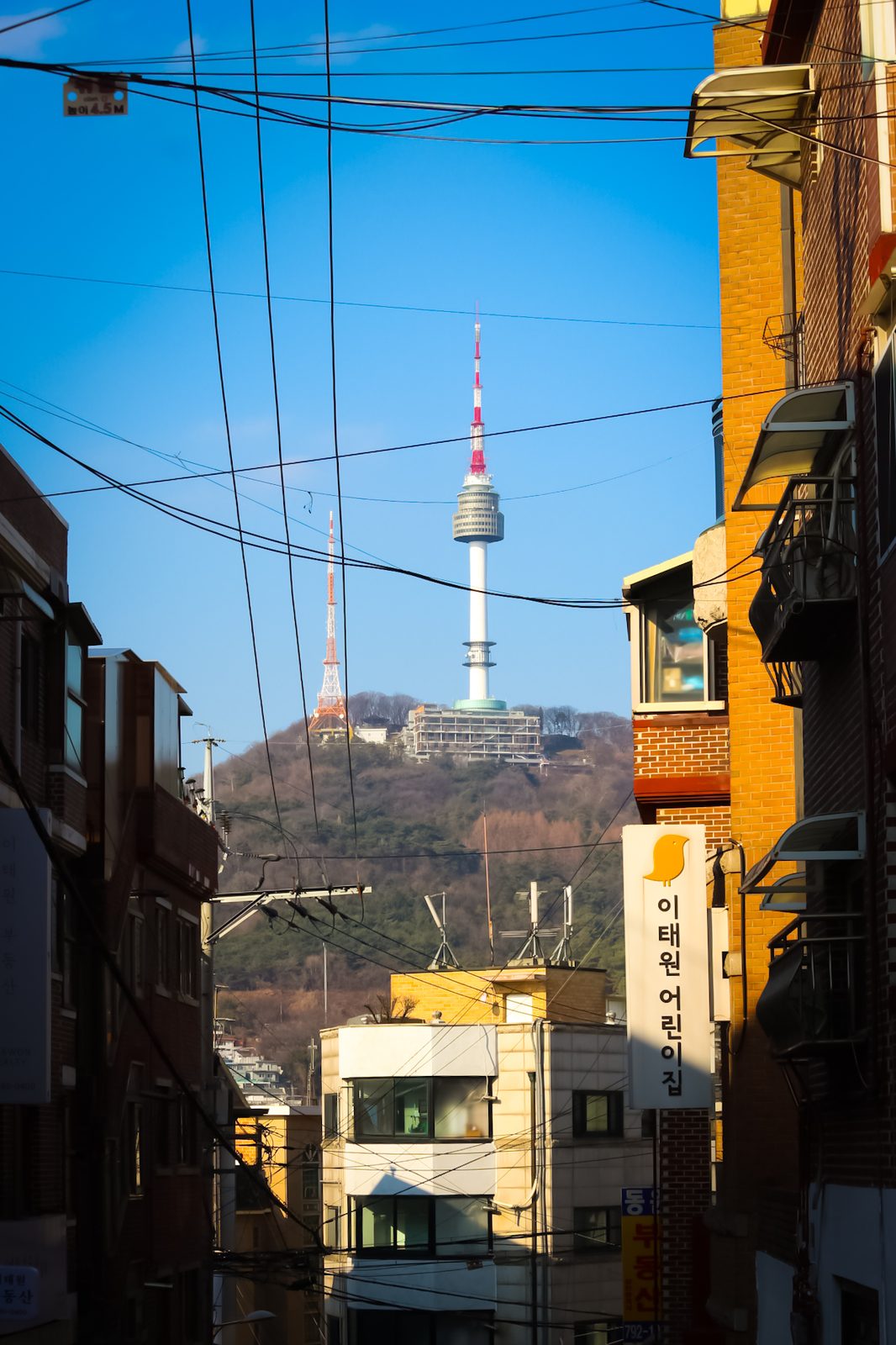 N Seoul Tower seen from a Seoul side street