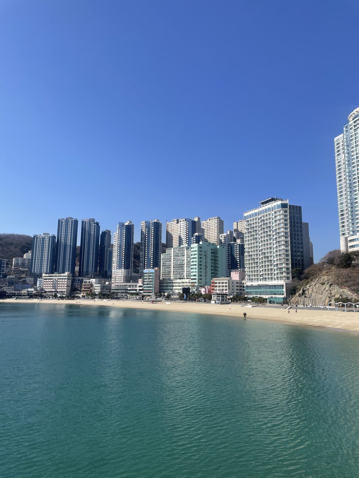Songdo beach and Busan skyline